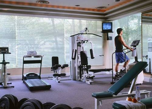 Gym - A well-equipped health and fitness club.