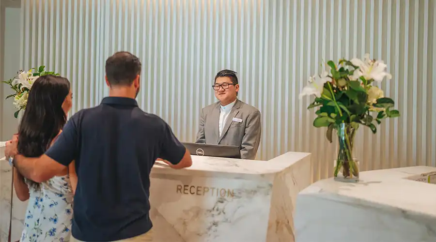 Couple greeted at reception