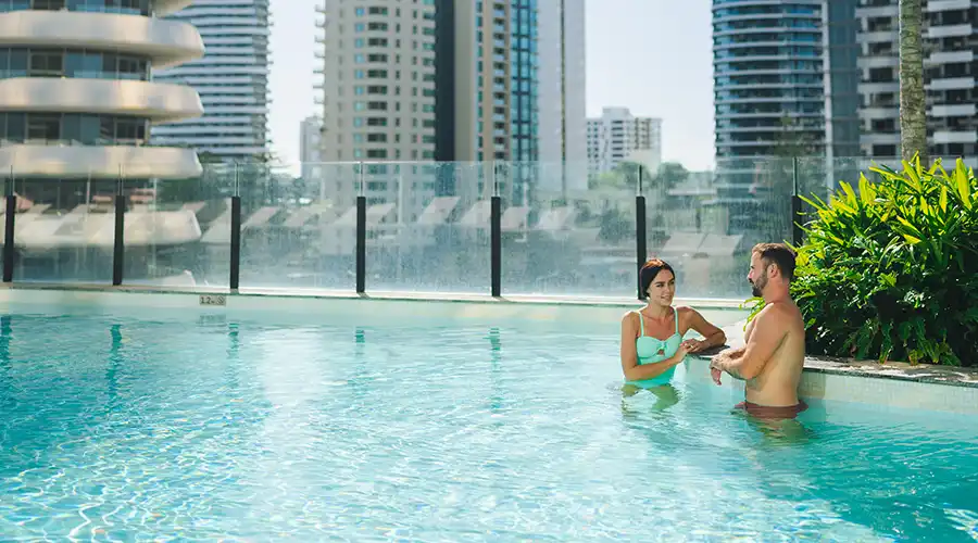 Couple take a dip in Dorsett Gold Coast's Isoletto Pool