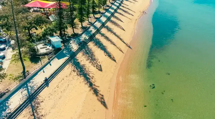 Tree Shadows on the sand of Suttons Beach QLD