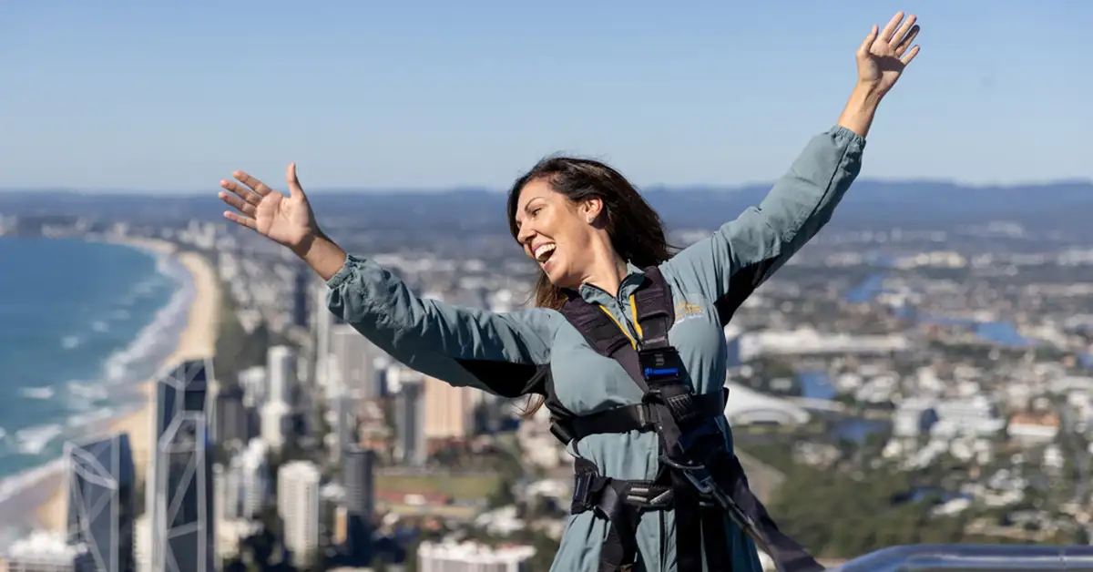 Woman enjoys panoramic views of the Gold Coast from Skypoint Observation Deck