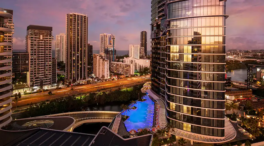 sunset light reflecting off Dorsett Gold Coast hotel
