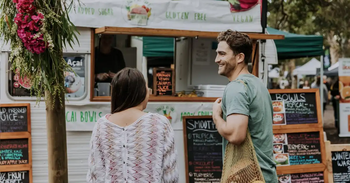 A couple at a Gold Coast vegan-friendly market