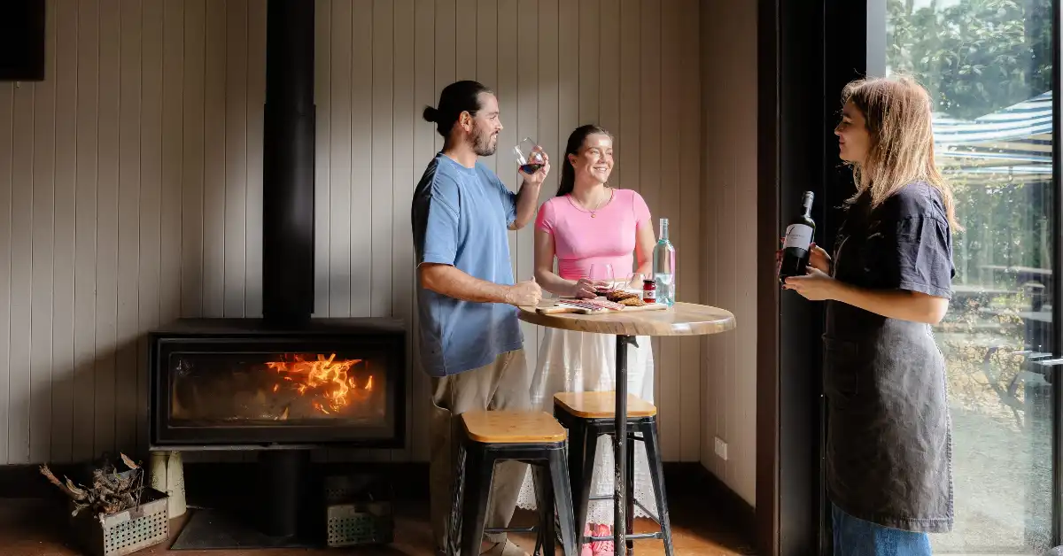 A couple tasting wines at Witches Falls' Wines