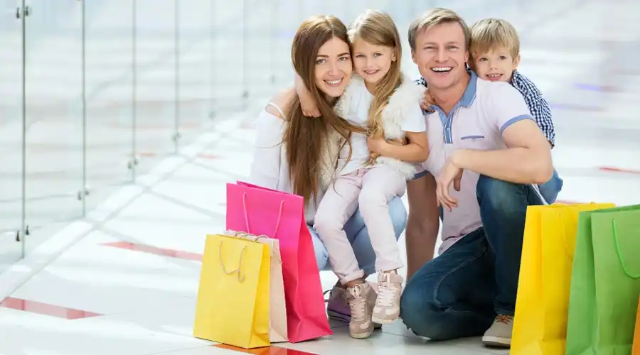 Family shopping at shopping centre
