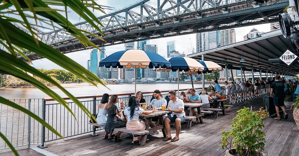 Friends catching up over beverages at Felons Brewing Co