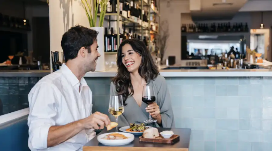 Couple enjoying drinks at the wine bar on James Street