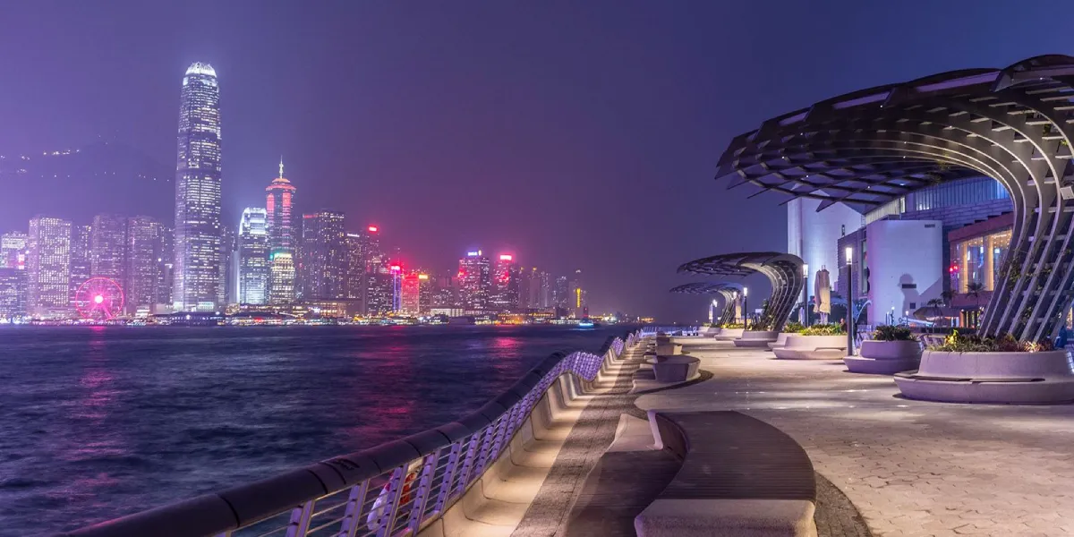 Visitors walking along the Avenue of Stars promenade at Tsim Sha Tsui  