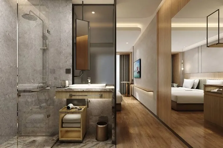 Modern guest room and bathroom interior with luxury furnishings, sleek décor, and elegant lighting