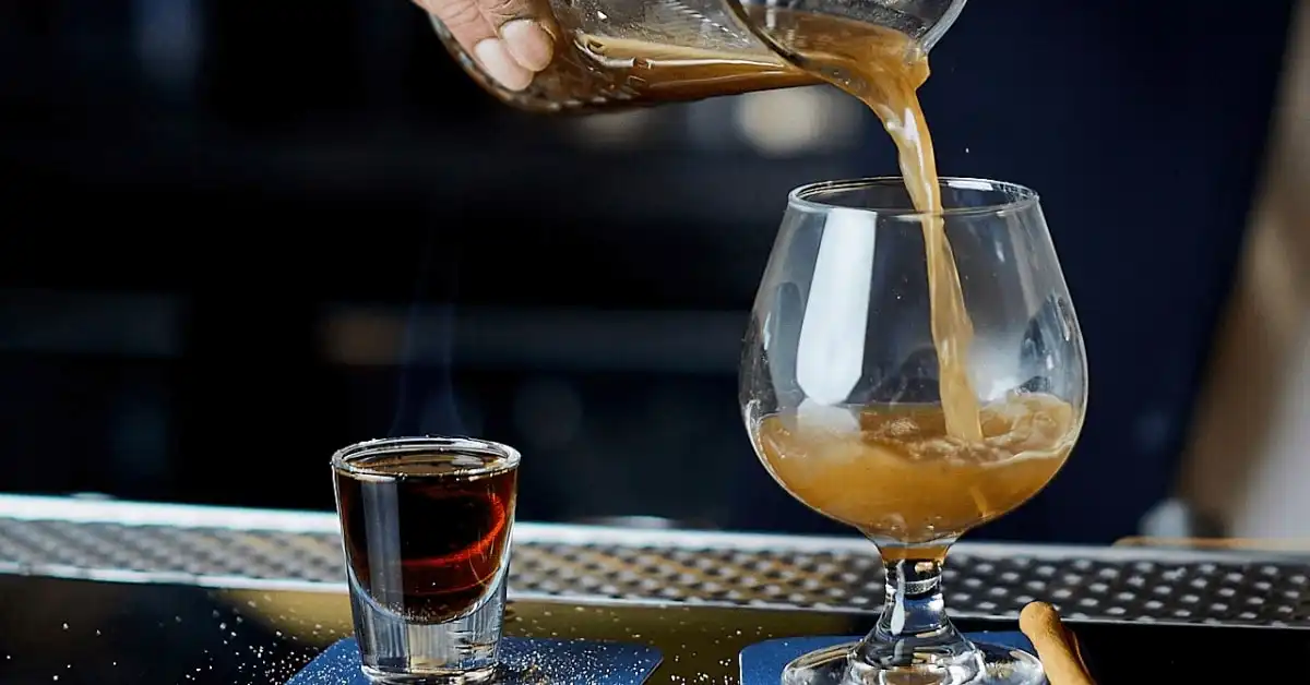 A cocktail being poured at Jin Bar, Dorsett Melbourne A cocktail being poured at Jin Bar, Dorsett Melbourne