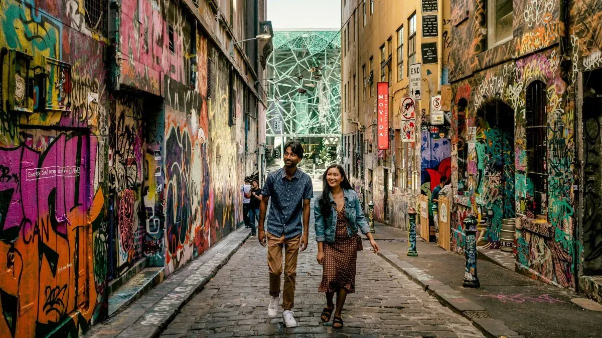 Walking through Hosier Lane in Melbourne CBD enjoyIing street art