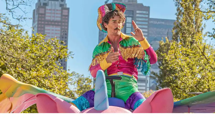 Colourful performer on unicorn float at Moomba Festival parade in Melbourne