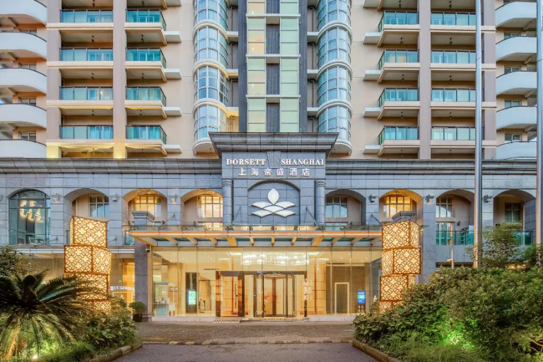 Exterior of Dorsett Shanghai Hotel during the day.