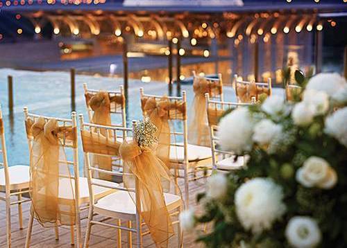 An amazing wedding by the pool with rooftop lake view